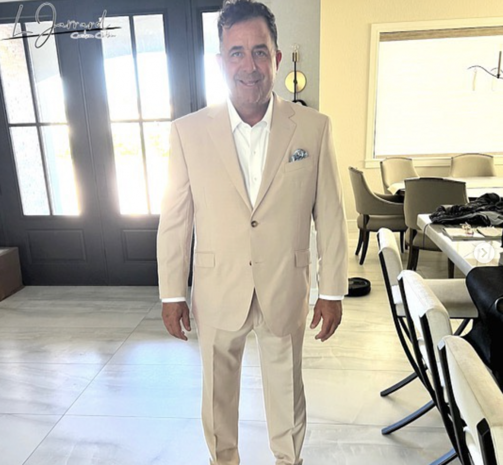 Satisfied customer who got a custom made suit and pants from L Jarrard